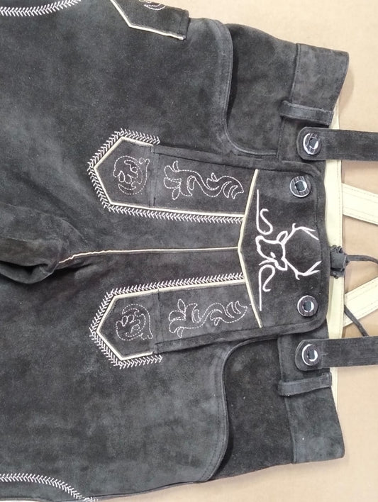 Charcoal lederhosen Brustriegel bib macro, herringbone edge stitching, white stag Reliefstickerei — Haider Living Phase 4 finishing