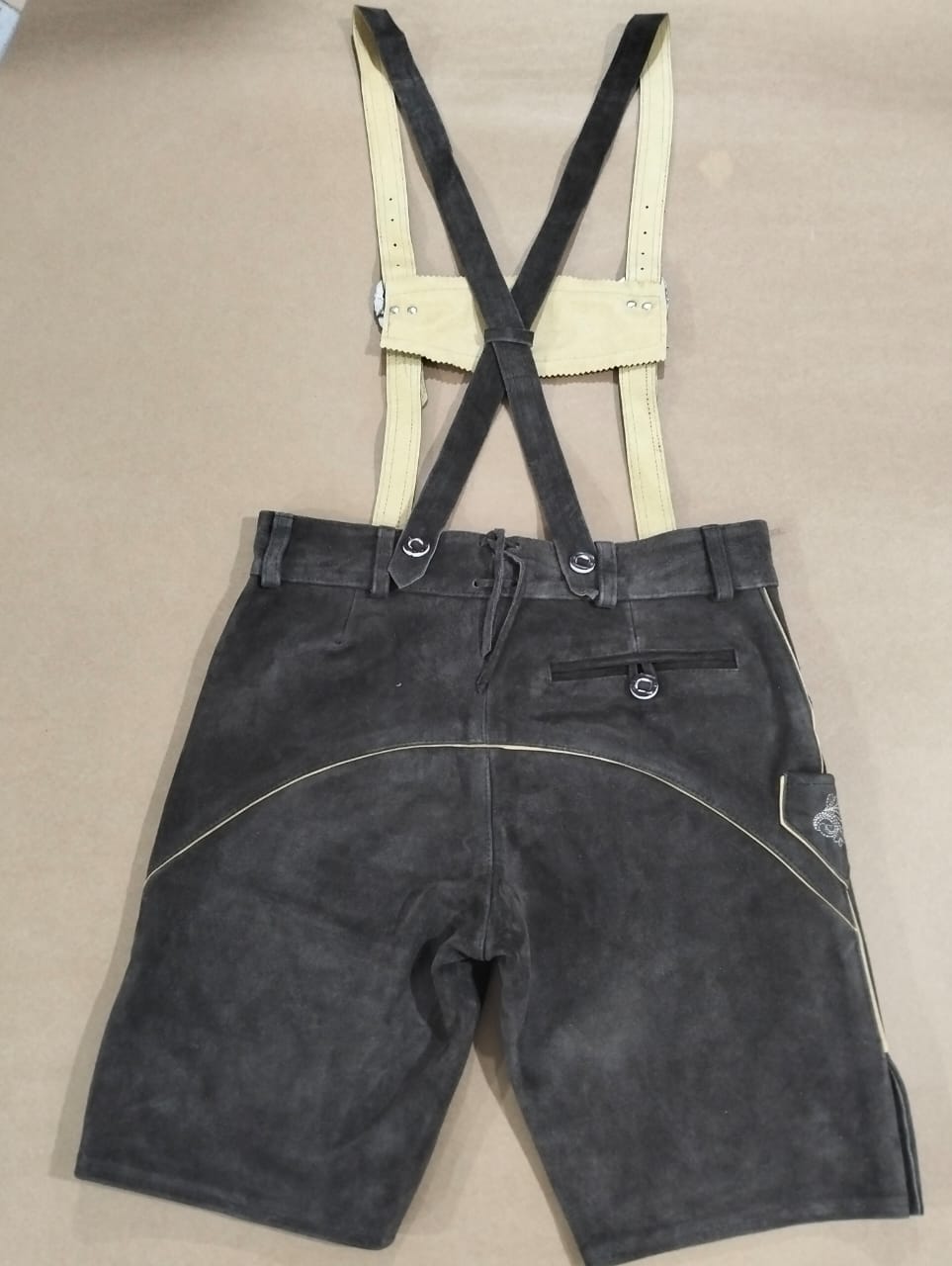 Charcoal lederhosen rear view, zip pocket, curved cream piping — Haider Living