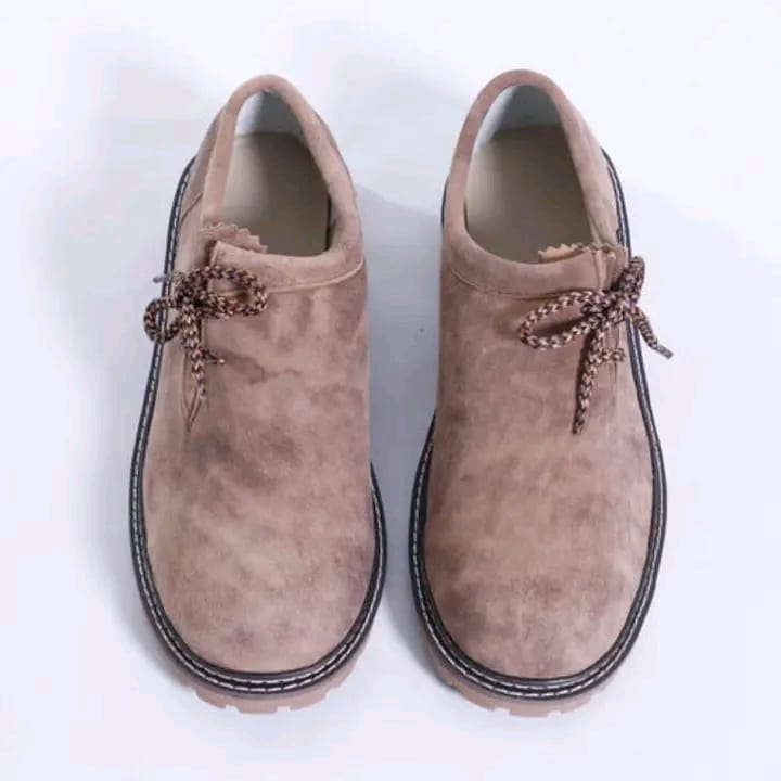 Sand tan suede Haferl shoes, aerial view, brown twisted cord lacing, black alpine rubber sole, white contrast welt stitching — Haider Living Sialkot Atelier