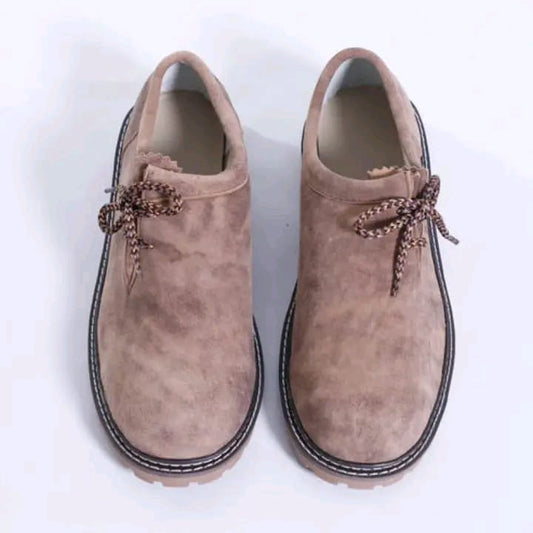 Sand tan suede Haferl shoes, aerial view, brown twisted cord lacing, black alpine rubber sole, white contrast welt stitching — Haider Living Sialkot Atelier