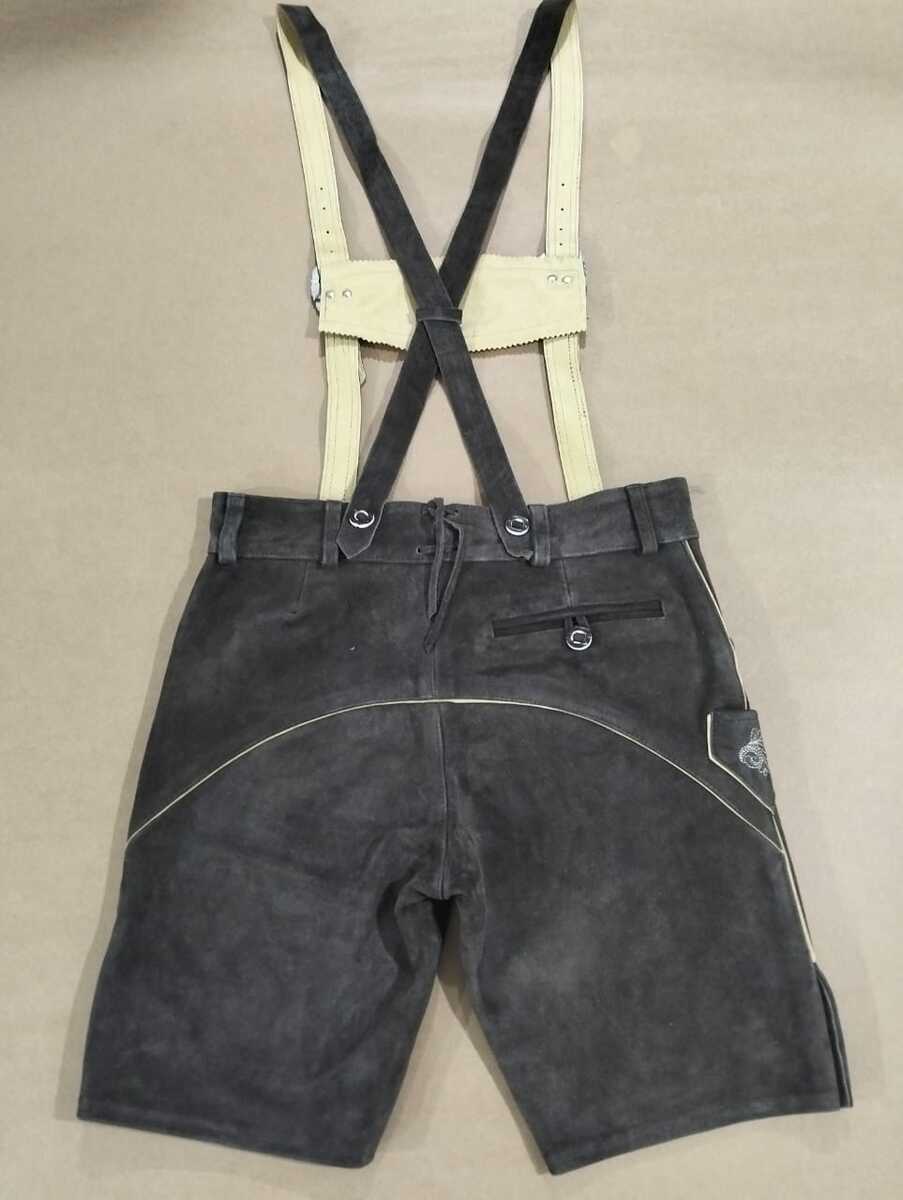 Oak tan full-grain leather Bavarian vest, structured lapels, antique brass buttons, front flap pockets — Haider Living Sialkot Atelier