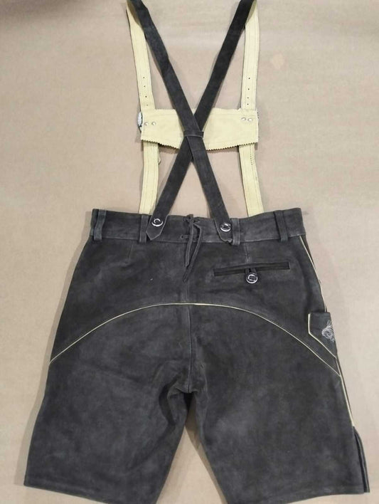 Charcoal slate distressed suede Bavarian lederhosen, full standing stag white Reliefstickerei on both legs, cream suspenders — Haider Living Sialkot Atelier